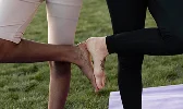 women-sportswear-working-out-outdoors touching their hands together